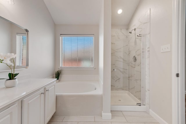 479 Sausalito Dr, Rockwall, TX 75087 - full bath with tile patterned flooring, healthy amount of natural light, a marble finish shower, and vanity