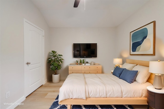 479 Sausalito Dr, Rockwall, TX 75087 - bedroom featuring light wood finished floors, baseboards, a ceiling fan, and vaulted ceiling