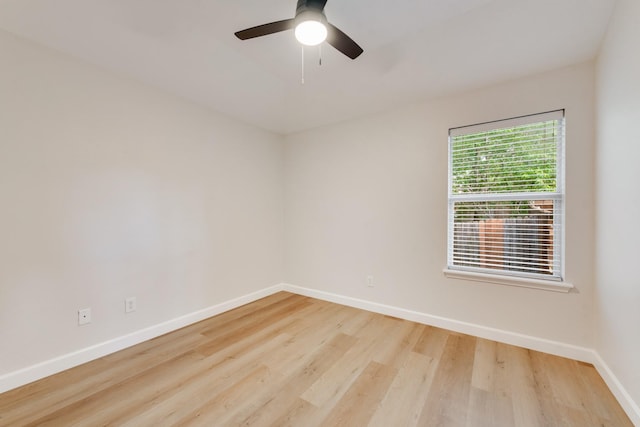 479 Sausalito Dr, Rockwall, TX 75087 - empty room with baseboards, wood finished floors, and a ceiling fan