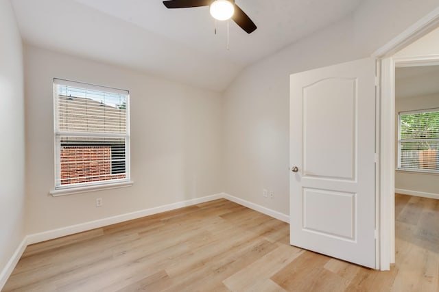 479 Sausalito Dr, Rockwall, TX 75087 - unfurnished room with light wood-style flooring, vaulted ceiling, baseboards, and a ceiling fan