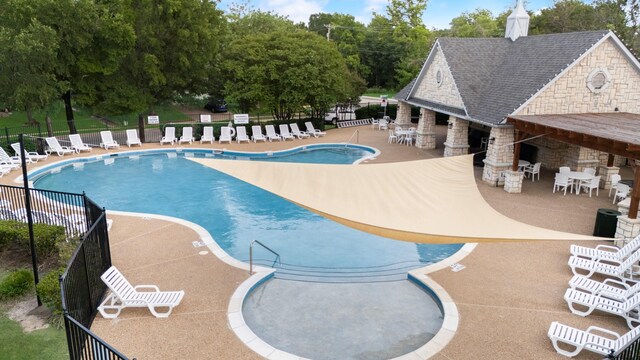479 Sausalito Dr, Rockwall, TX 75087 - community pool with a patio and an outdoor structure