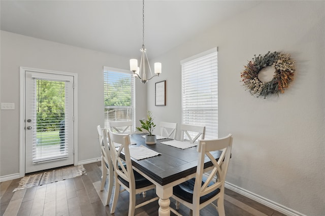 520 Shoreline Ridge Dr, Little Elm, TX 75068 - dining space featuring a chandelier, dark wood-style floors, and baseboards