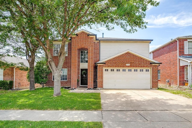 1308 Stetson Trl, Saginaw, TX 76131 - traditional-style house with a garage, concrete driveway, and a front yard
