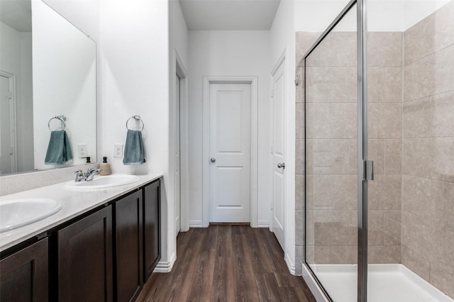 791 Evergreen St, Princeton, TX 75407 - full bath featuring a shower stall, wood finished floors, and double vanity