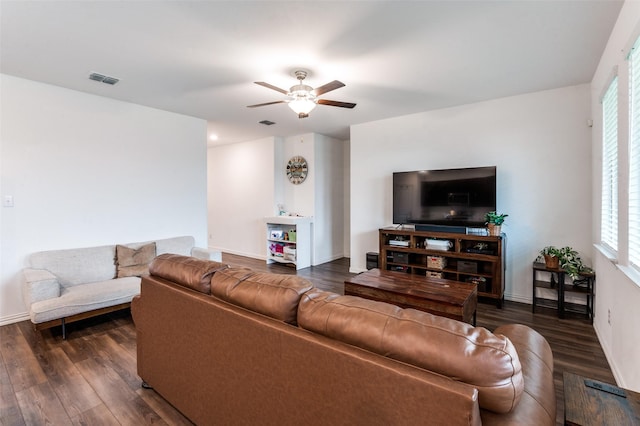 791 Evergreen St, Princeton, TX 75407 - living room featuring ceiling fan, dark wood-type flooring, and baseboards