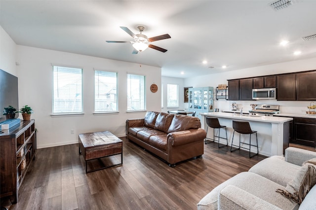 791 Evergreen St, Princeton, TX 75407 - living room with healthy amount of natural light, dark wood-type flooring, a ceiling fan, recessed lighting, and baseboards