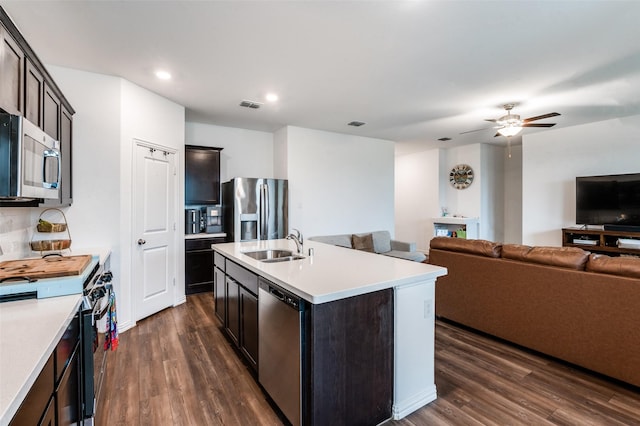 791 Evergreen St, Princeton, TX 75407 - kitchen with stainless steel appliances, a sink, open floor plan, dark wood finished floors, and recessed lighting