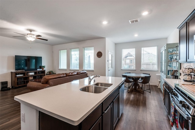 791 Evergreen St, Princeton, TX 75407 - kitchen with a sink, appliances with stainless steel finishes, light countertops, dark wood-type flooring, and recessed lighting