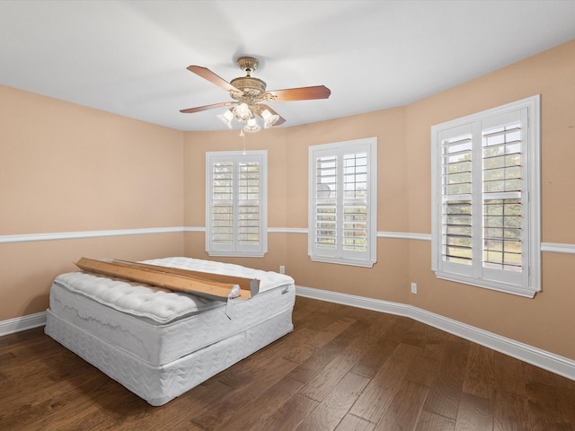 333 Forest Trl, Weatherford, TX 76085 - bedroom with baseboards, wood finished floors, and a ceiling fan