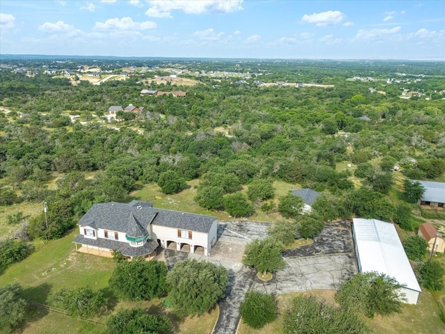 333 Forest Trl, Weatherford, TX 76085 - aerial view of property and surrounding area featuring a heavily wooded area