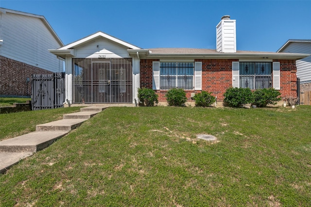 7419 Concordia Ln, Dallas, TX 75241 - view of front of house with brick siding, a front lawn, and a chimney