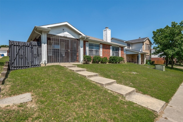 7419 Concordia Ln, Dallas, TX 75241 - view of front of house featuring brick siding and a chimney