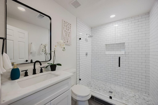 1410 Lee Ave, Fort Worth, TX 76164 - bathroom with a shower stall, vanity, toilet, and recessed lighting