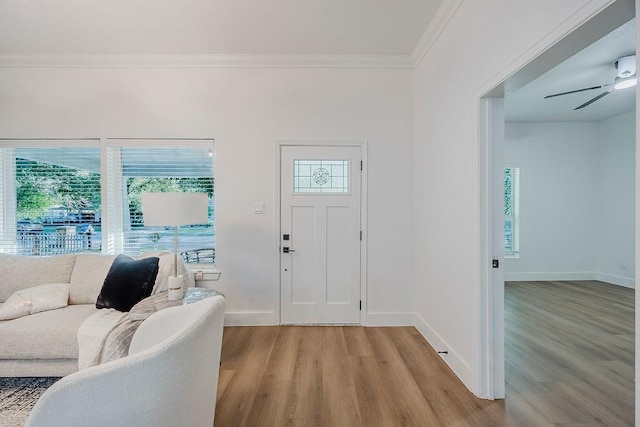 1410 Lee Ave, Fort Worth, TX 76164 - foyer with light wood finished floors, crown molding, baseboards, and ceiling fan