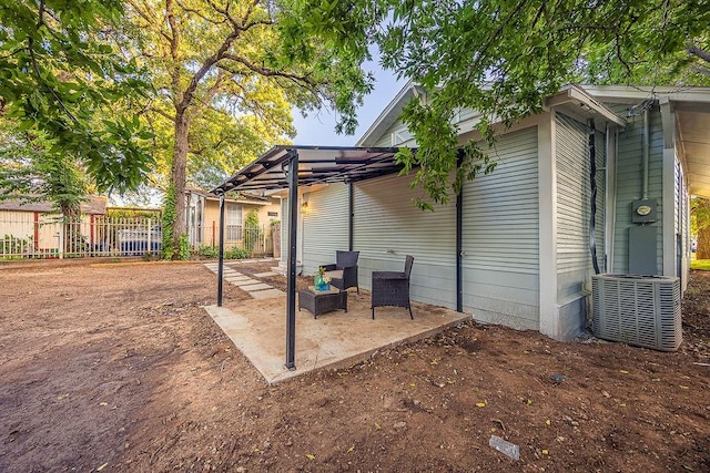 1410 Lee Ave, Fort Worth, TX 76164 - view of patio / terrace with central AC