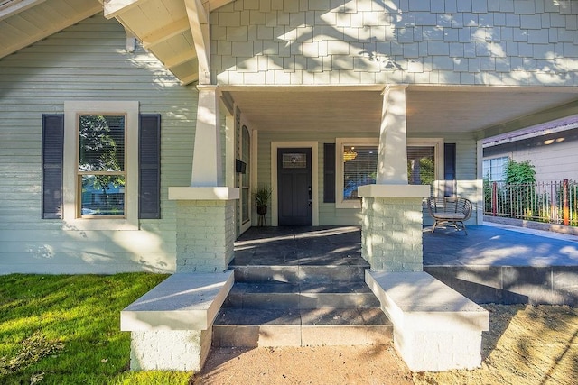 1410 Lee Ave, Fort Worth, TX 76164 - view of exterior entry featuring a porch