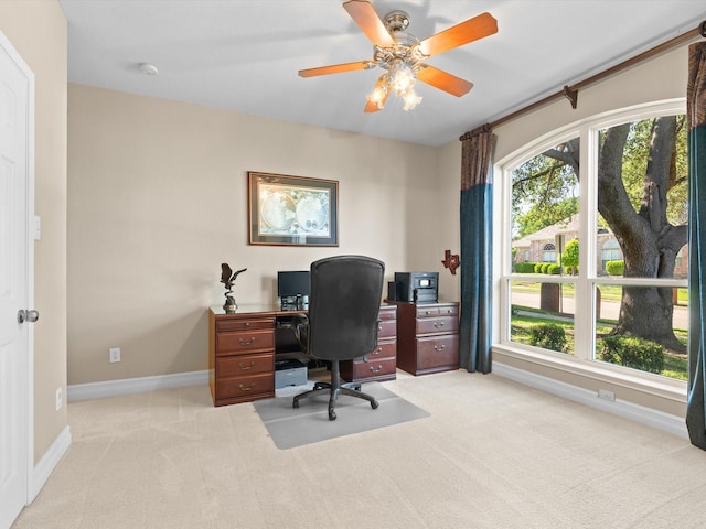 2448 Sky Harbor Dr, Plano, TX 75025 - home office with light carpet, baseboards, and ceiling fan