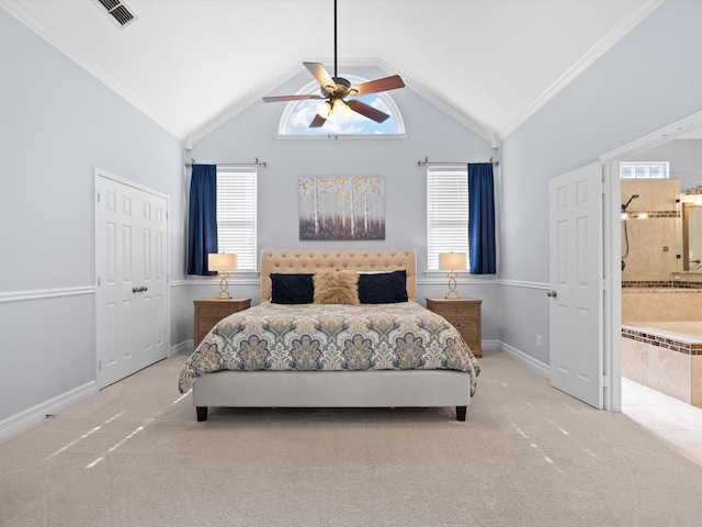2448 Sky Harbor Dr, Plano, TX 75025 - carpeted bedroom featuring crown molding, baseboards, lofted ceiling, ensuite bathroom, and a ceiling fan