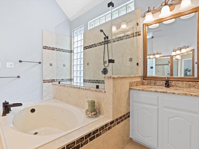 2448 Sky Harbor Dr, Plano, TX 75025 - full bathroom with tiled shower, a jetted tub, vanity, and lofted ceiling