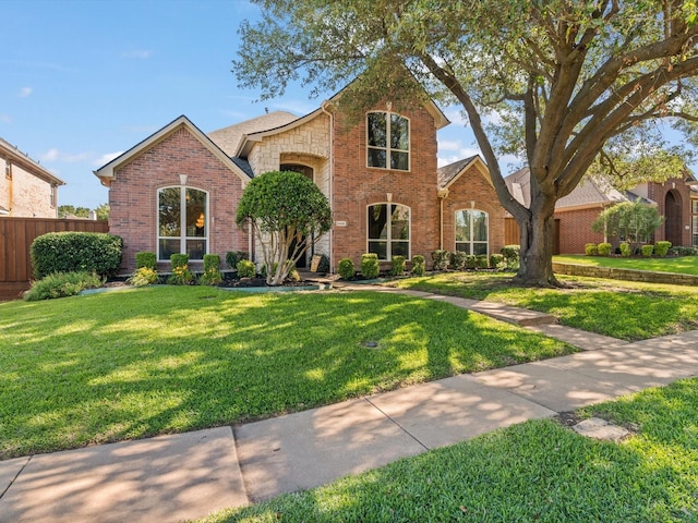 2448 Sky Harbor Dr, Plano, TX 75025 - traditional-style home featuring brick siding and stone siding