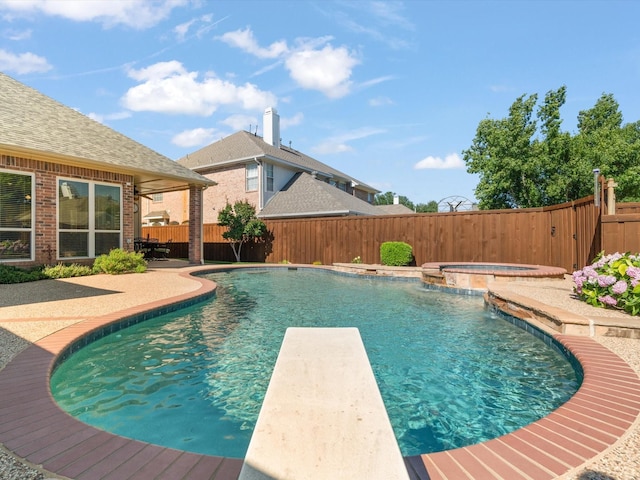 2448 Sky Harbor Dr, Plano, TX 75025 - view of swimming pool featuring a fenced backyard, a patio area, a diving board, and a pool with connected hot tub