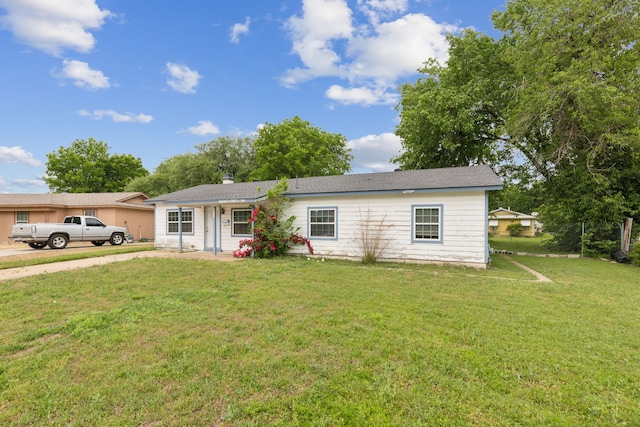 5225 Ira St N, Haltom City, TX 76117 - single story home with a front lawn and concrete driveway