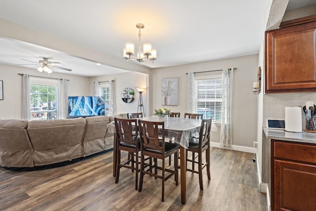 3607 Cortez Dr, Dallas, TX 75220 - dining area with dark wood finished floors, a chandelier, baseboards, and ceiling fan