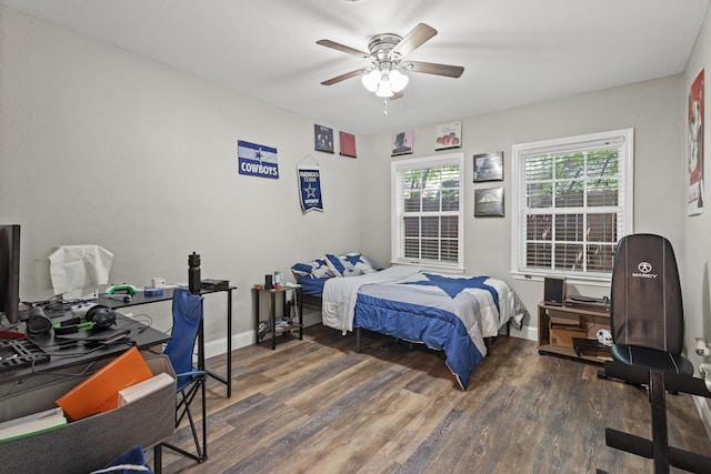 3607 Cortez Dr, Dallas, TX 75220 - bedroom with wood finished floors, a desk, baseboards, and ceiling fan
