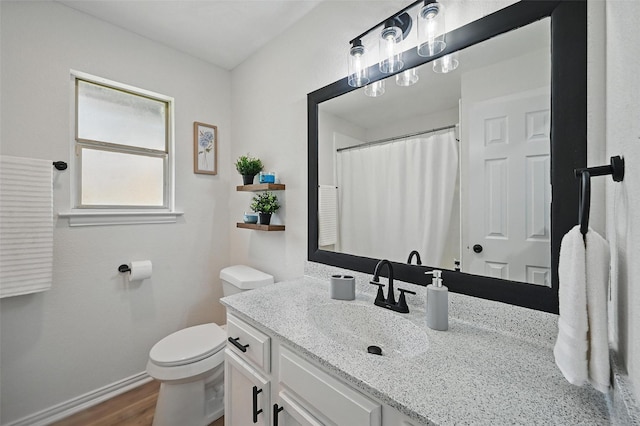 400 Baldwin Dr, Joshua, TX 76058 - full bath featuring toilet, vanity, wood finished floors, baseboards, and a shower with curtain