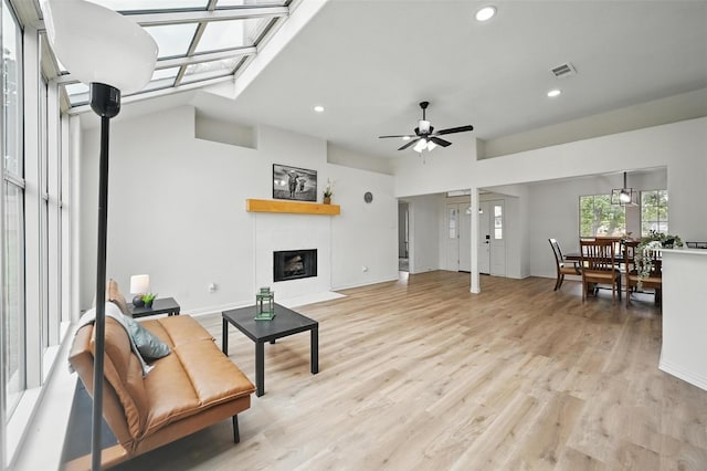 400 Baldwin Dr, Joshua, TX 76058 - living room featuring recessed lighting, ceiling fan, a tile fireplace, light wood finished floors, and baseboards