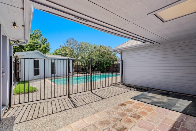 2810 Live Oak Dr, Rowlett, TX 75088 - view of pool with a patio area and an outdoor structure