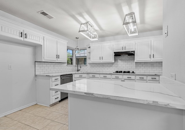 2810 Live Oak Dr, Rowlett, TX 75088 - kitchen with dishwasher, under cabinet range hood, white cabinets, backsplash, and gas cooktop
