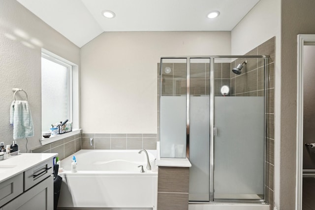 3613 Texas Dall Ct, Mckinney, TX 75071 - bathroom featuring a shower stall, vanity, a bath, recessed lighting, and lofted ceiling