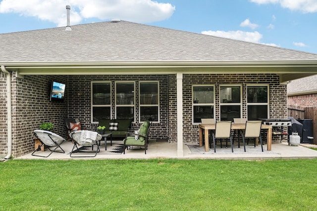 3613 Texas Dall Ct, Mckinney, TX 75071 - back of property with brick siding, roof with shingles, a patio area, and an outdoor living space