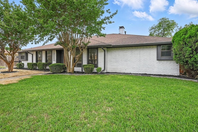 1425 Cassandra Cir, Desoto, TX 75115 - ranch-style home featuring brick siding, a front lawn, a chimney, and a shingled roof