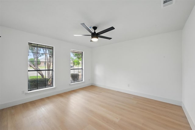 1425 Cassandra Cir, Desoto, TX 75115 - unfurnished room with light wood-type flooring, baseboards, and ceiling fan
