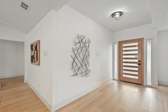 1425 Cassandra Cir, Desoto, TX 75115 - entrance foyer with wood finished floors, baseboards, and vaulted ceiling