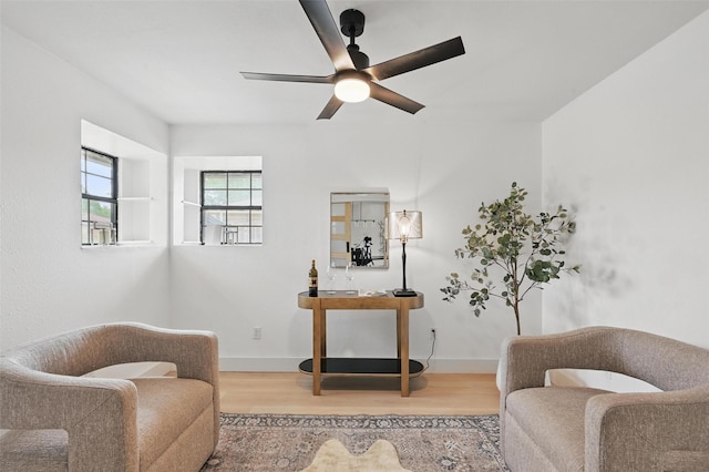 1425 Cassandra Cir, Desoto, TX 75115 - sitting room with wood finished floors, a ceiling fan, and baseboards
