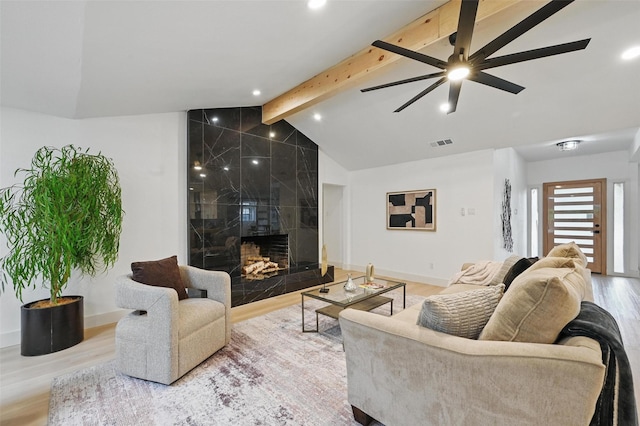 1425 Cassandra Cir, Desoto, TX 75115 - living room with wood finished floors, a high end fireplace, ceiling fan, baseboards, and recessed lighting
