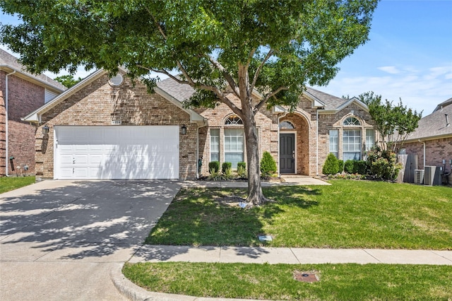 4824 Carolina Trace Trl, Fort Worth, TX 76244 - traditional-style house with a garage, a front yard, driveway, and brick siding