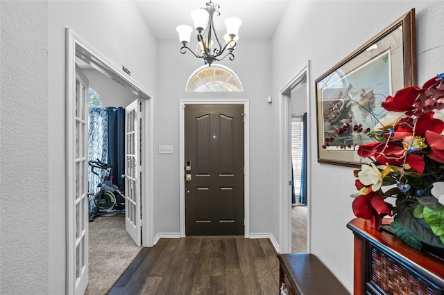 4824 Carolina Trace Trl, Fort Worth, TX 76244 - foyer entrance featuring a chandelier, wood finished floors, and baseboards