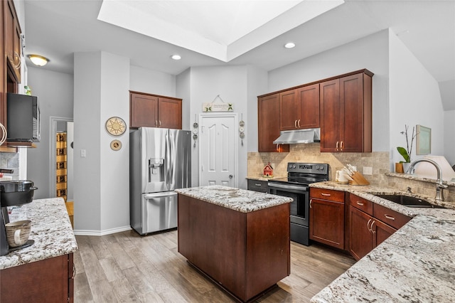 4824 Carolina Trace Trl, Fort Worth, TX 76244 - kitchen featuring stainless steel appliances, a sink, under cabinet range hood, light stone counters, and recessed lighting