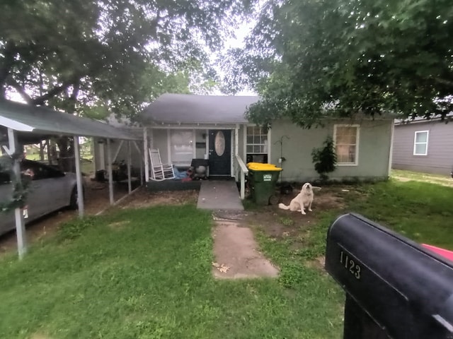 1123 Gilliam St, Bellmead, TX 76705 - view of front facade featuring a front lawn