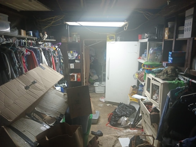 1123 Gilliam St, Bellmead, TX 76705 - below grade area featuring freestanding refrigerator