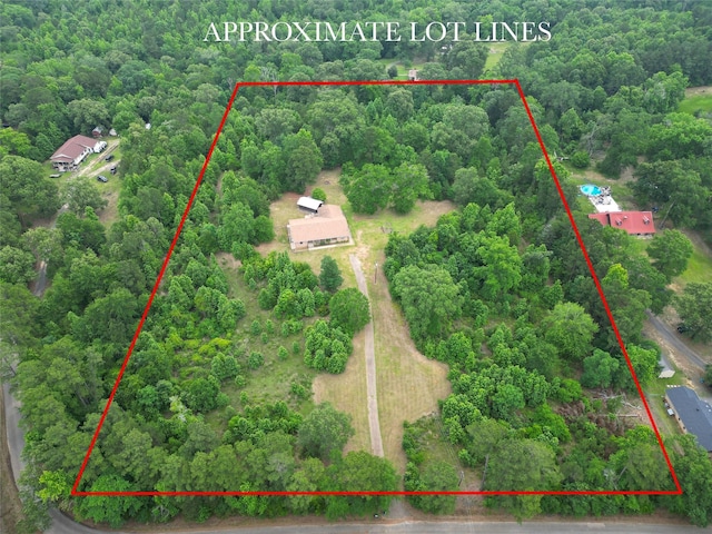 2630 E Lake Dr, Gladewater, TX 75647 - aerial overview of property's location featuring a forest and property boundaries highlighted
