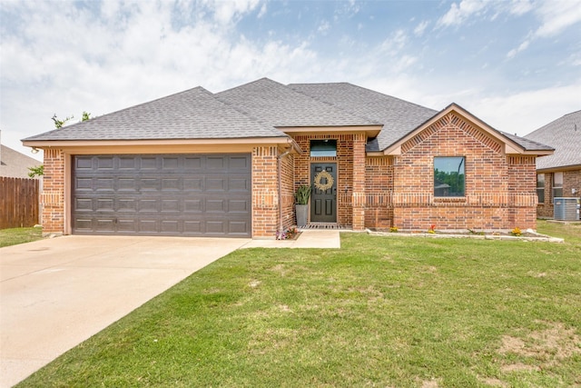 405 Lockwood Ln, Weatherford, TX 76087 - view of front of house featuring brick siding, a shingled roof, concrete driveway, a garage, and central AC unit