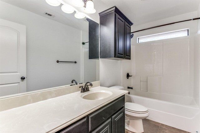 405 Lockwood Ln, Weatherford, TX 76087 - full bath with toilet, vanity, bathing tub / shower combination, and tile patterned floors