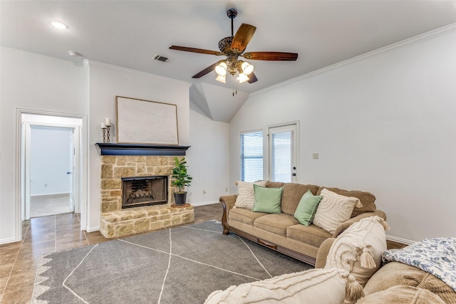 405 Lockwood Ln, Weatherford, TX 76087 - living area featuring ornamental molding, a ceiling fan, baseboards, a fireplace, and lofted ceiling