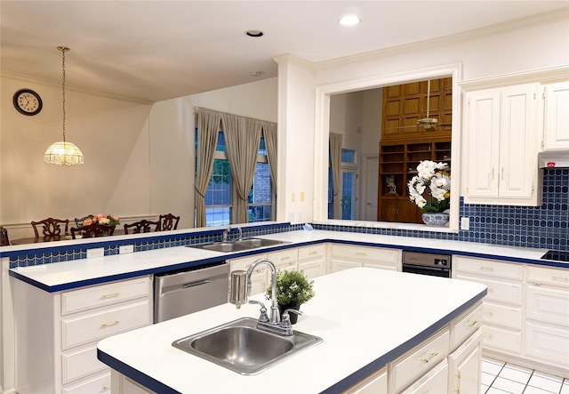 7100 Deer Run, Plano, TX 75024 - kitchen featuring a sink, stainless steel dishwasher, hanging light fixtures, an island with sink, and ornamental molding