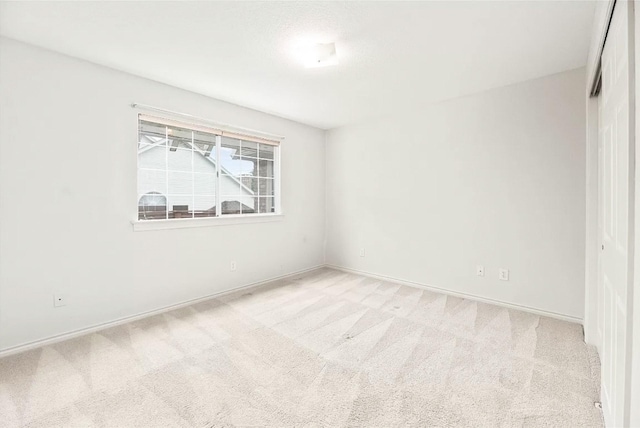 7100 Deer Run, Plano, TX 75024 - unfurnished bedroom featuring carpet floors, baseboards, and a closet
